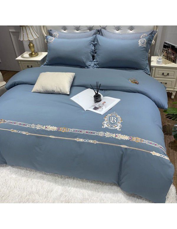 The manufacturer directly supplies 60 pieces of ground wool four piece sets of light luxury embroidered quilt sets, sheets, fitted sheets and four seasons bedding wholesale 