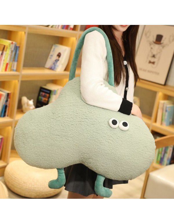 New cute and cute little monster plush toy pillow can be carried and carried doll doll sofa cushion pillow